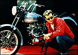james_dean_red_jacket_rebel_crouched_motorcycle_1.